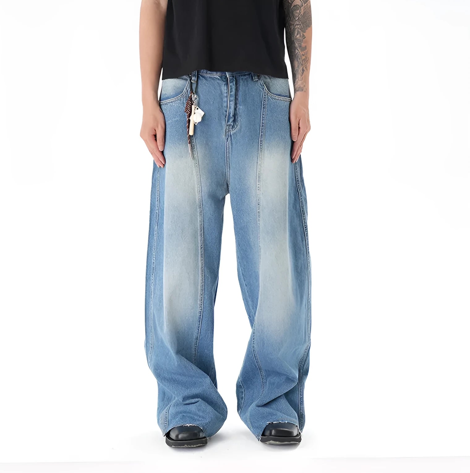 Light blue vintage washed wide leg machete jeans with zip fly closure on size chart