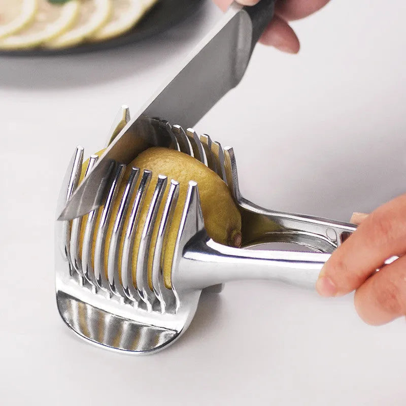 Silver plastic lemon slicer kitchen gadget on a cutting board
