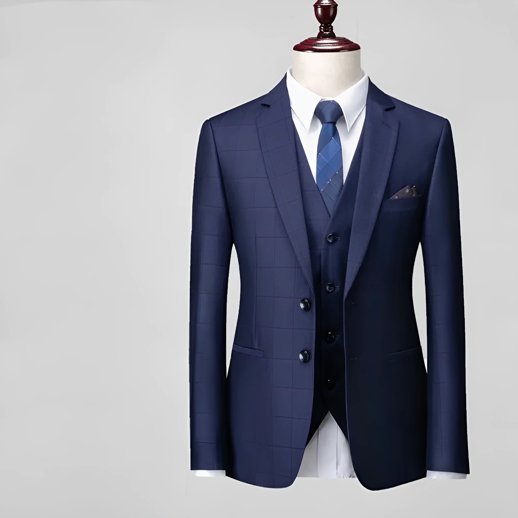 Men's navy blue plaid slim fit three-piece suit showing vest, jacket and trousers