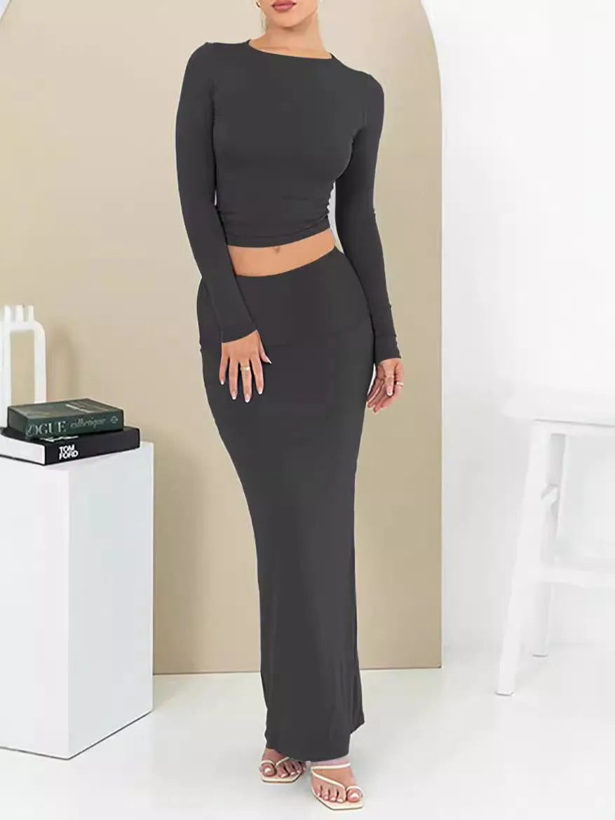 Women's sweet style two-piece suit with crop top and long skirt in polyester fabric