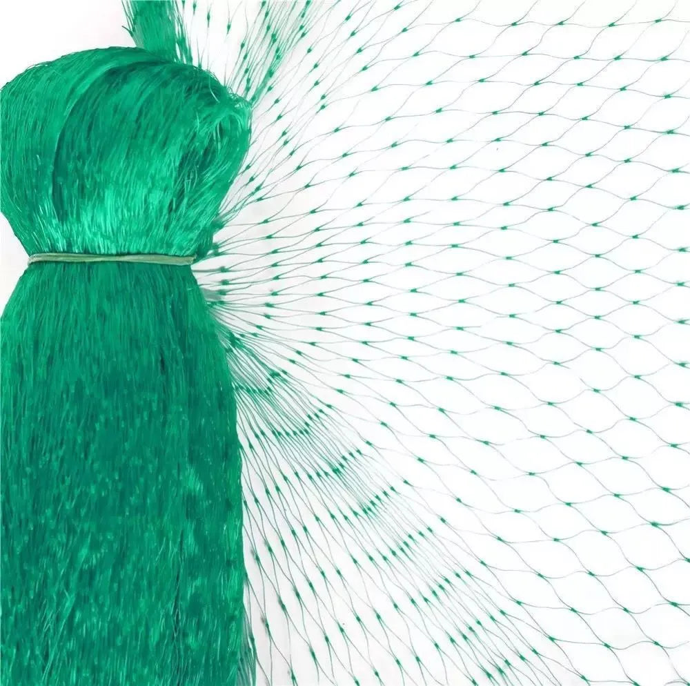 Green polypropylene garden bird net draped over a fruit tree for anti-bird protection
