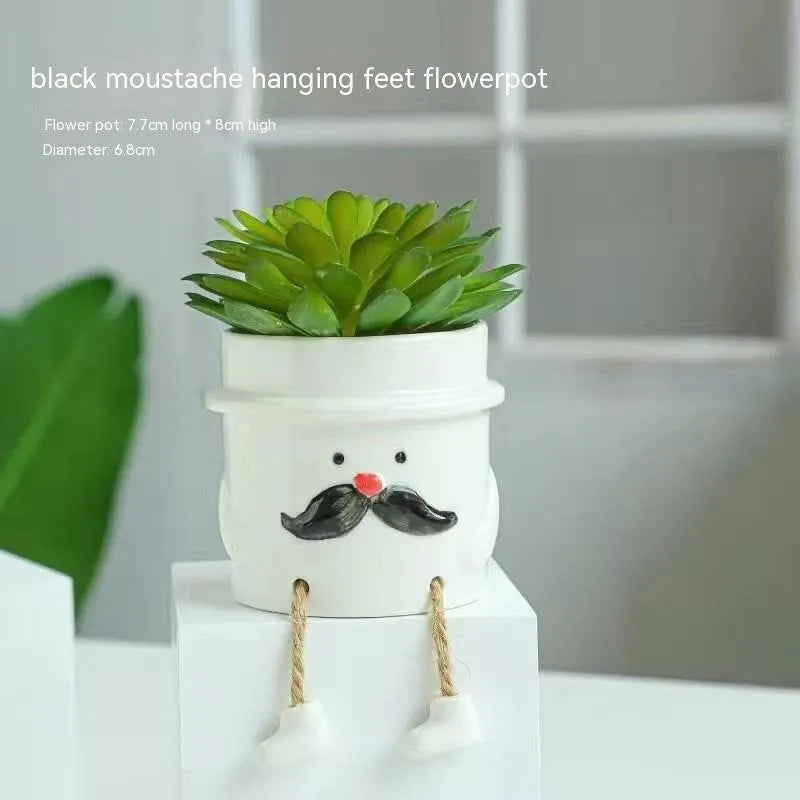 Ceramic hanging foot flowerpot with cartoon design in one of twelve colour variants for succulent plants