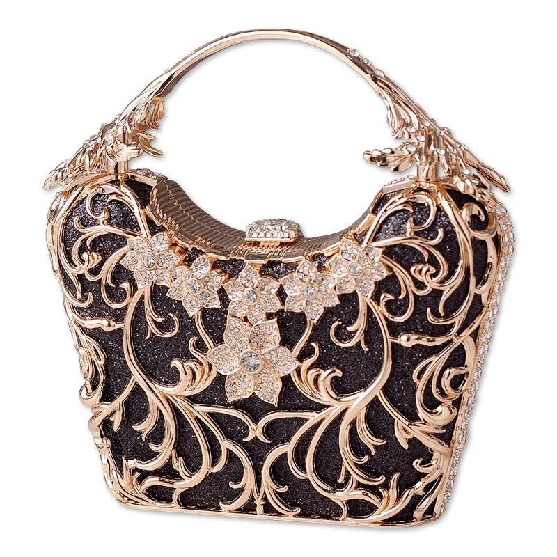Silver hollow-out party clutch with shiny finish, flower motif, and bucket shape on a plain background