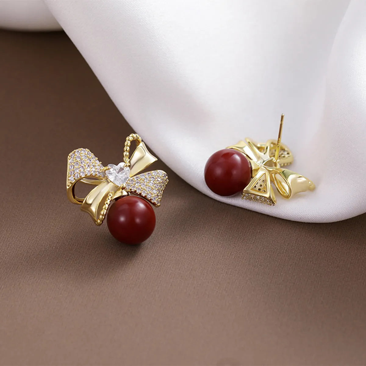 Beizhu zircon gold plated red high colour preserving stud earrings on white background