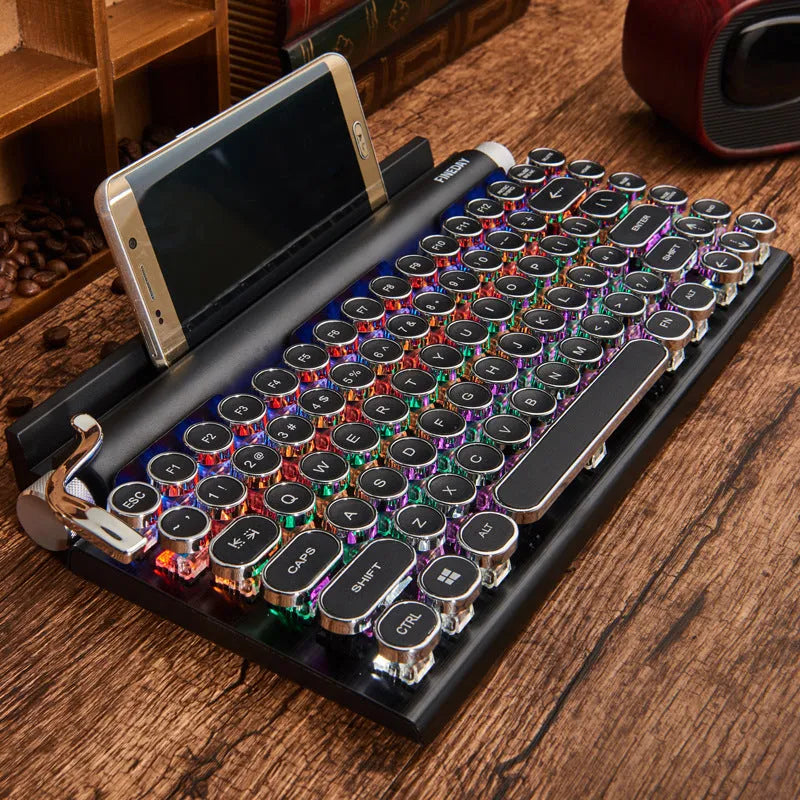 Black retro-style Bluetooth mechanical keyboard with RGB backlight on a wooden desk