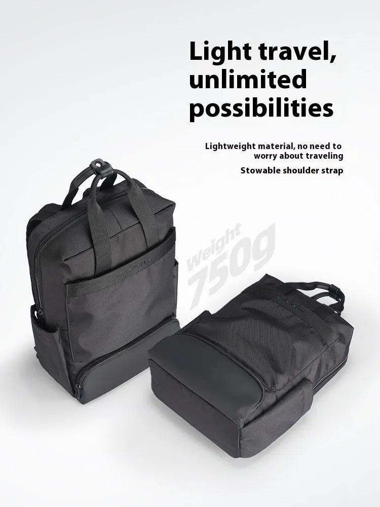 Black Oxford cloth lightweight computer backpack with 20-35 litre capacity.