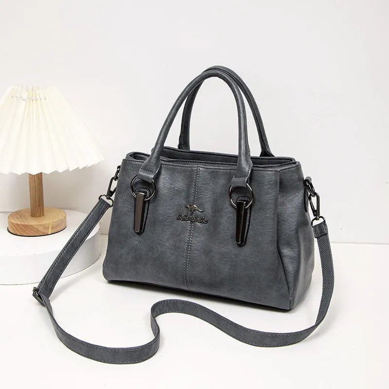 Women's large capacity crossbody soft leather bag in PU material, horizontal square shape, with sandwich zipper pocket, available in multiple colours