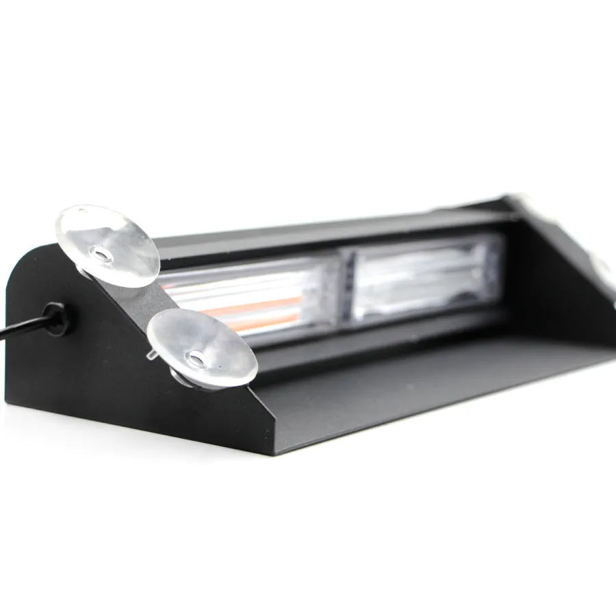 LED strobe light with aluminum housing and suction cup mount on a car windscreen