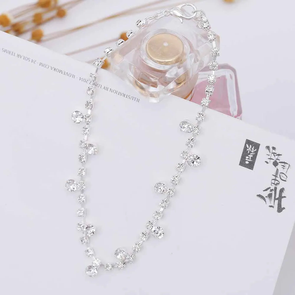 Women's silver alloy water drop tassel anklet with adjustable chain and artificial gem inlay