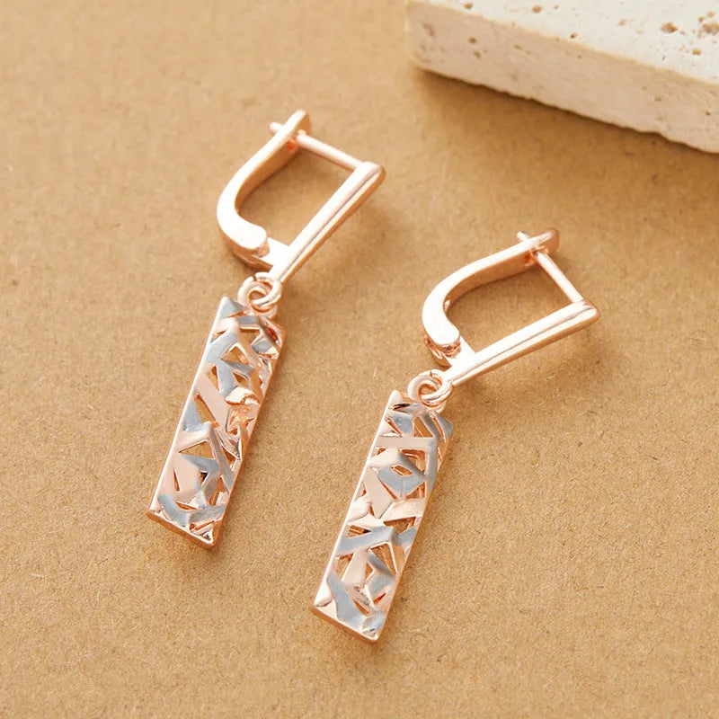 Rectangle hollow stud earrings with two-tone electroplated finish geometric design
