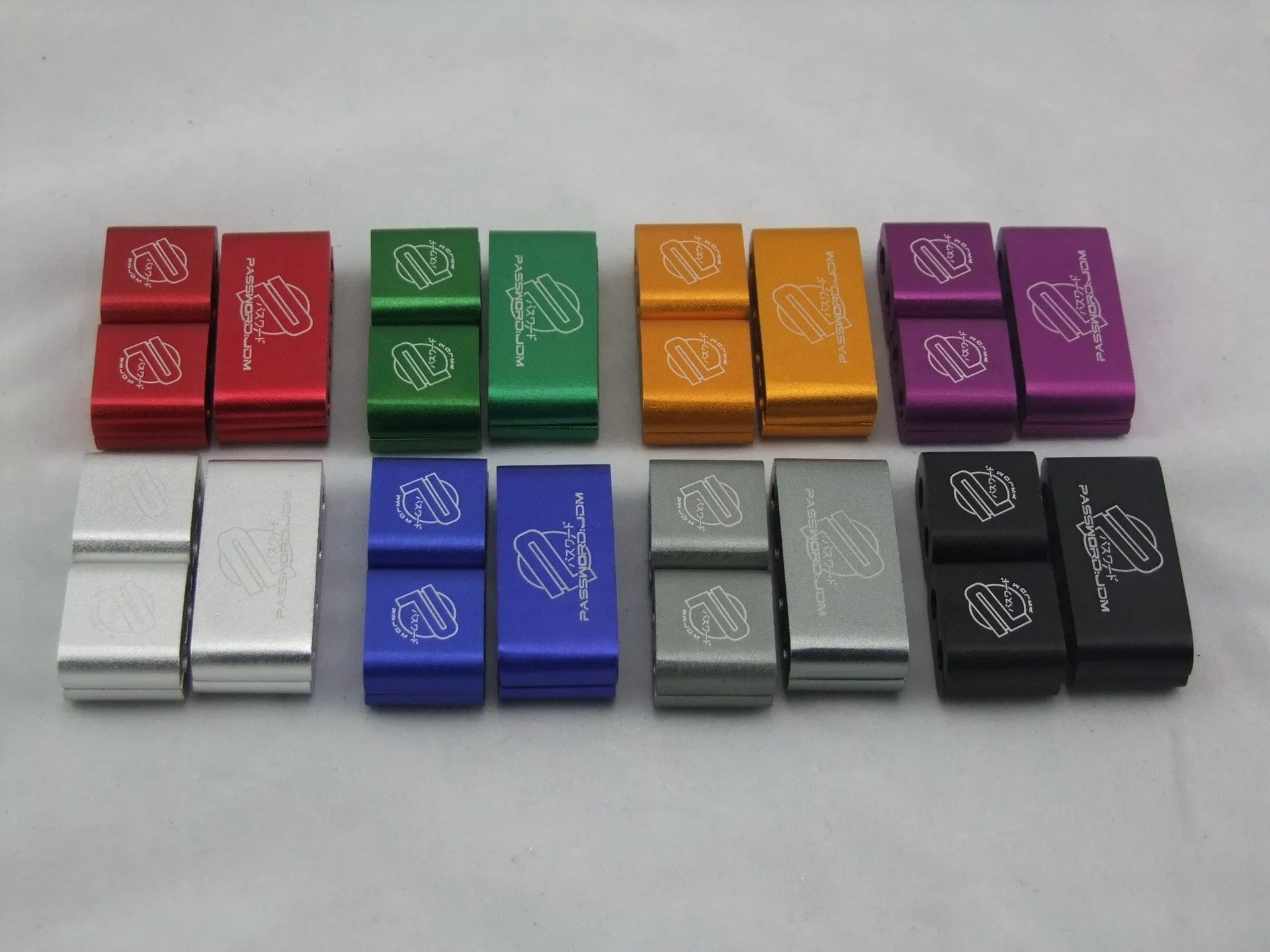 Three-piece metal automotive fastening clamp in six colour options, showing 55x30x25mm dimensions with metal sleeve.