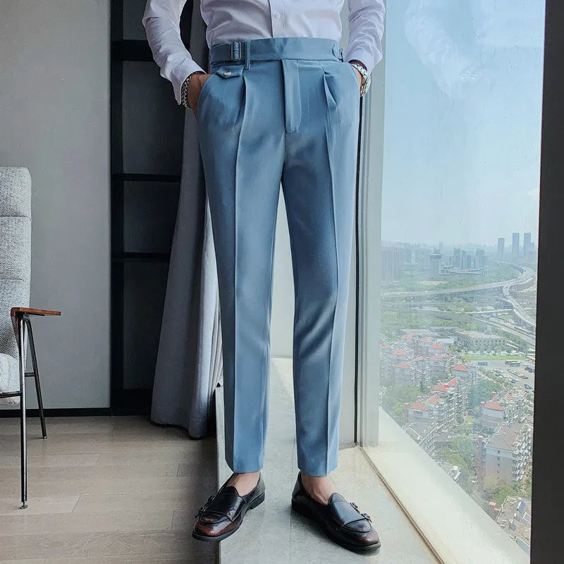 Straight leg casual trousers in solid colours on a size chart background.