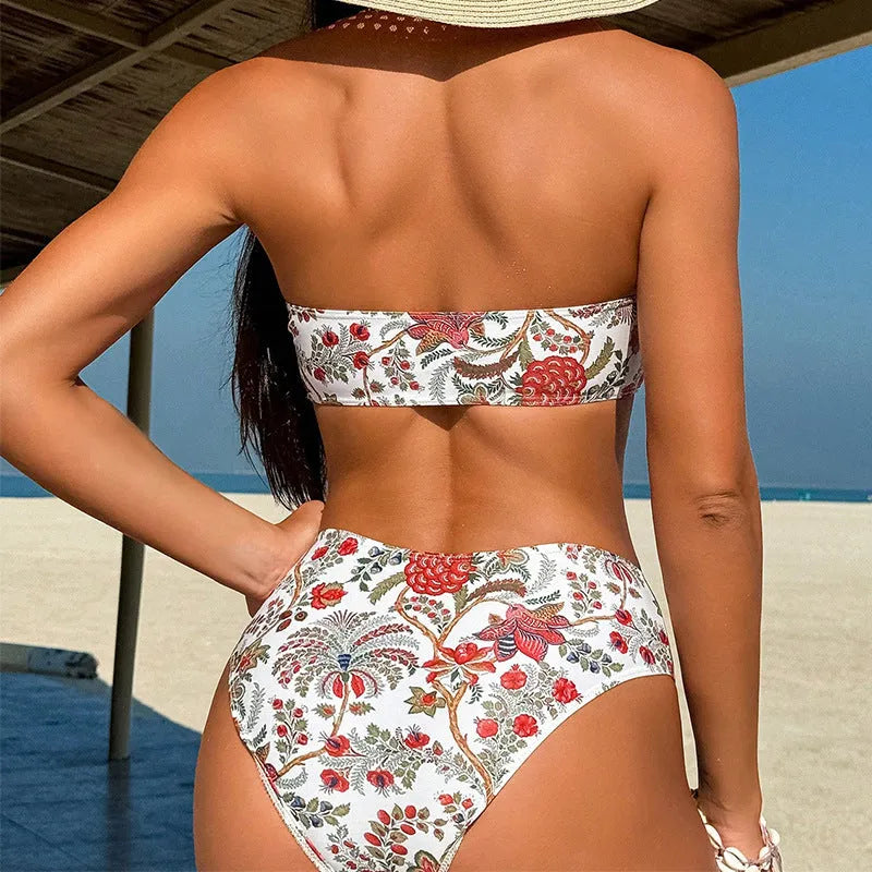 Women's printed bandeau swimsuit set with triangle top and matching shorts on a neutral background.