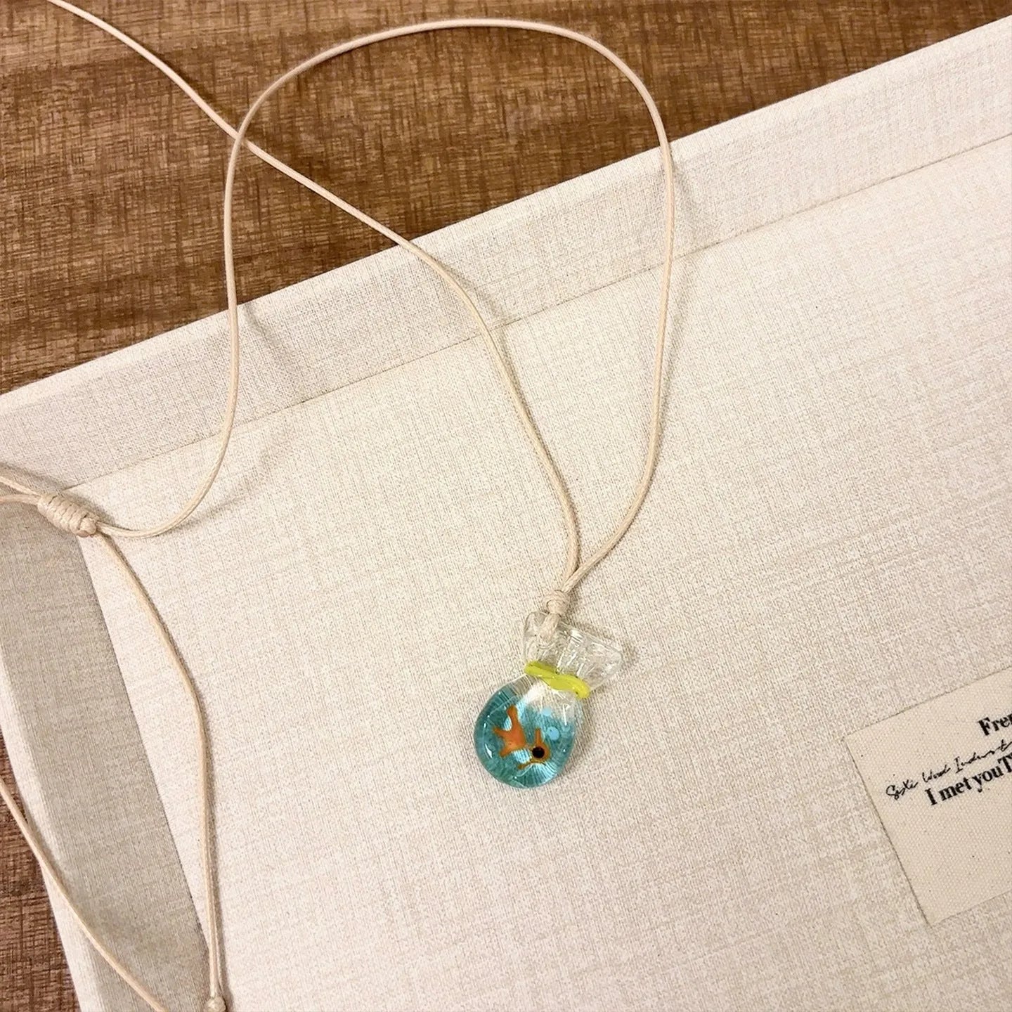 Women's coloured glaze skirt pendant necklace with joker design on cotton linen clavicle chain