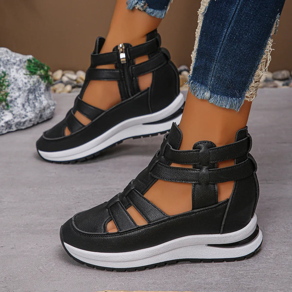 Women's black close-toed hollow-out platform sandals with Velcro fastening showing round toe design