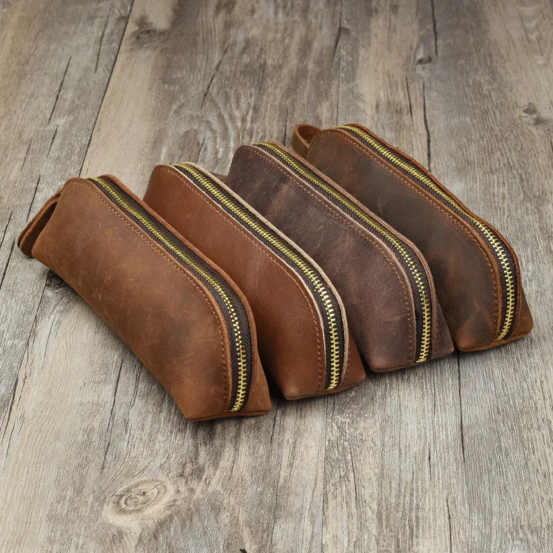 Square cowhide leather pencil case with zip closure measuring 18cm