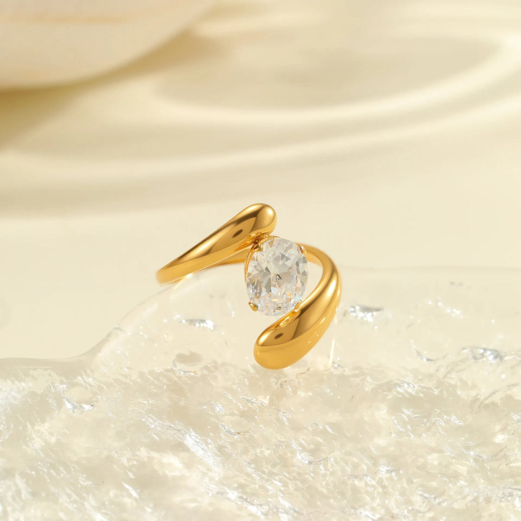 Geometric stainless steel zircon ring with open-mouth adjustable design on a hand.
