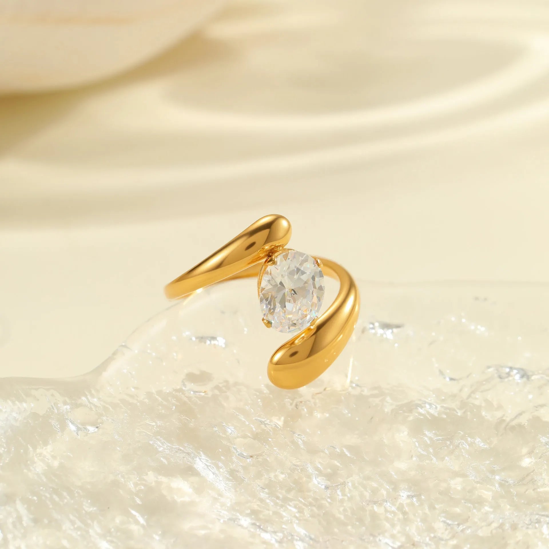 Geometric stainless steel zircon ring with open-mouth adjustable design on a hand.