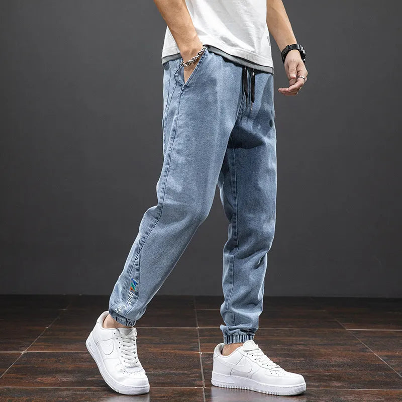 Men's cropped oversized slimming straight leg jeans in black, grey, and blue with high elasticity cotton blend