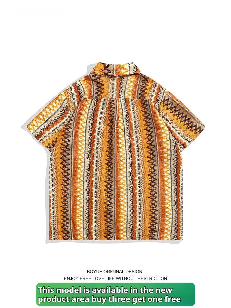 Ethnic style woven shirt with Cuban collar and contrast colours, shown in a loose fit with short sleeves.
