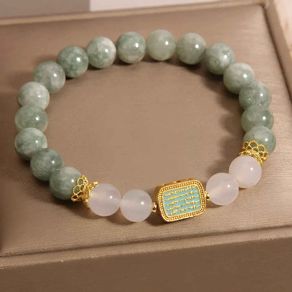 Women's oil green emerald crystal bracelet with five scripture bead design on wrist