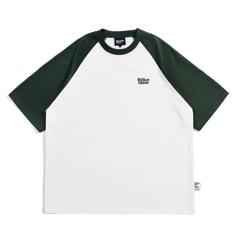 Blue loose-fit men's raglan sleeve T-shirt on a hanger, front view.