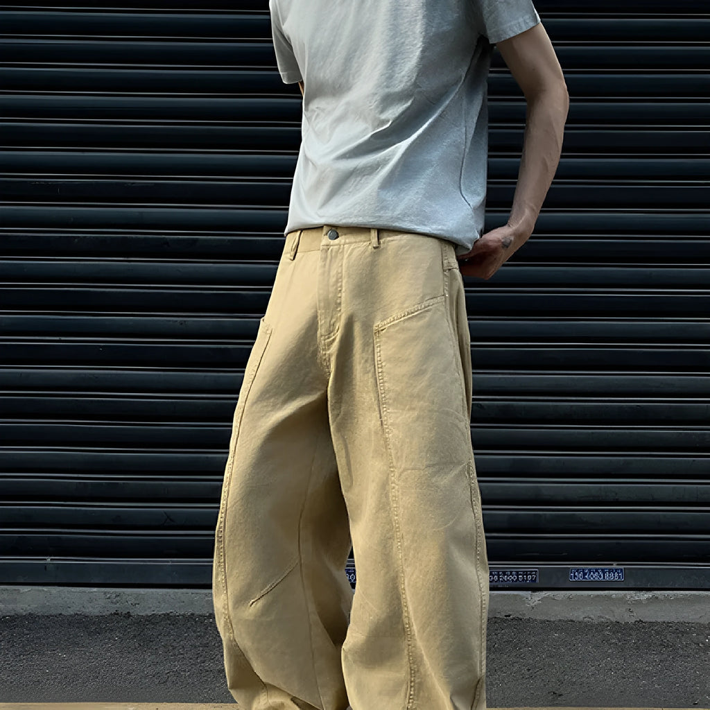 Men's khaki coloured straight-leg cotton casual trousers laid flat