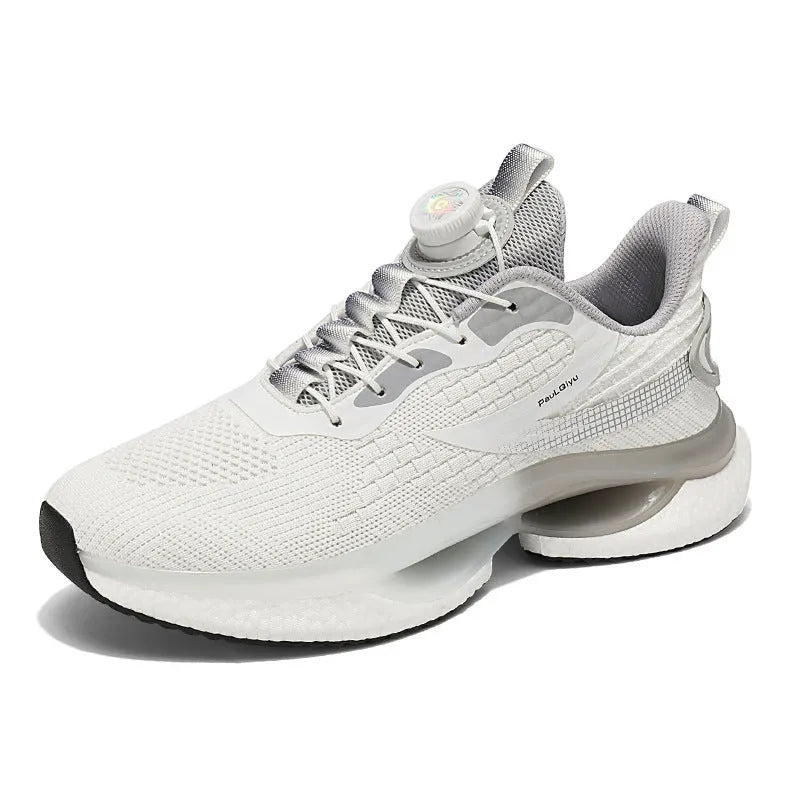 White rotating buckle running shoe with fly-kit mesh upper and low-top design on a solid background.