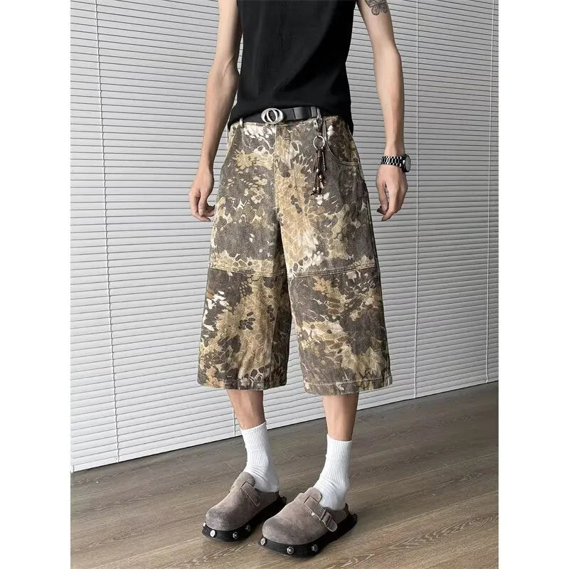 Yellow snake camouflage pattern on cropped denim jeans