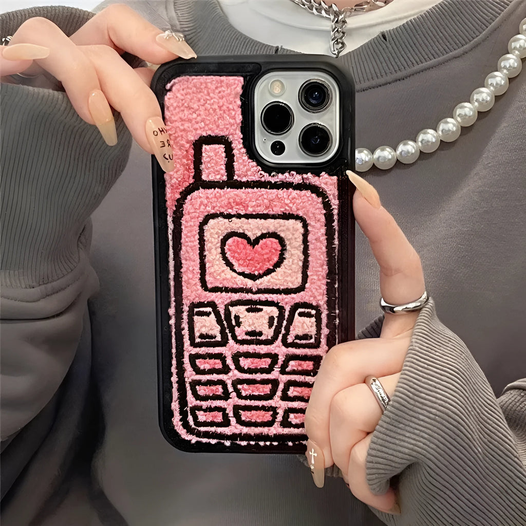 Pink towel embroidered TPU iPhone case showing textured surface on back cover.