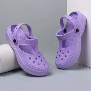 Women's EVA non-slip platform slippers in solid colour with cartoon flower design, available in pink