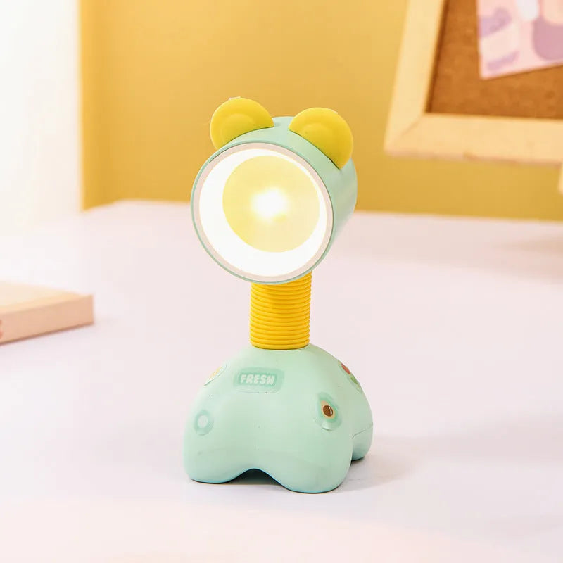 Cartoon animal magnetic night lamp with adjustable head on metallic surface