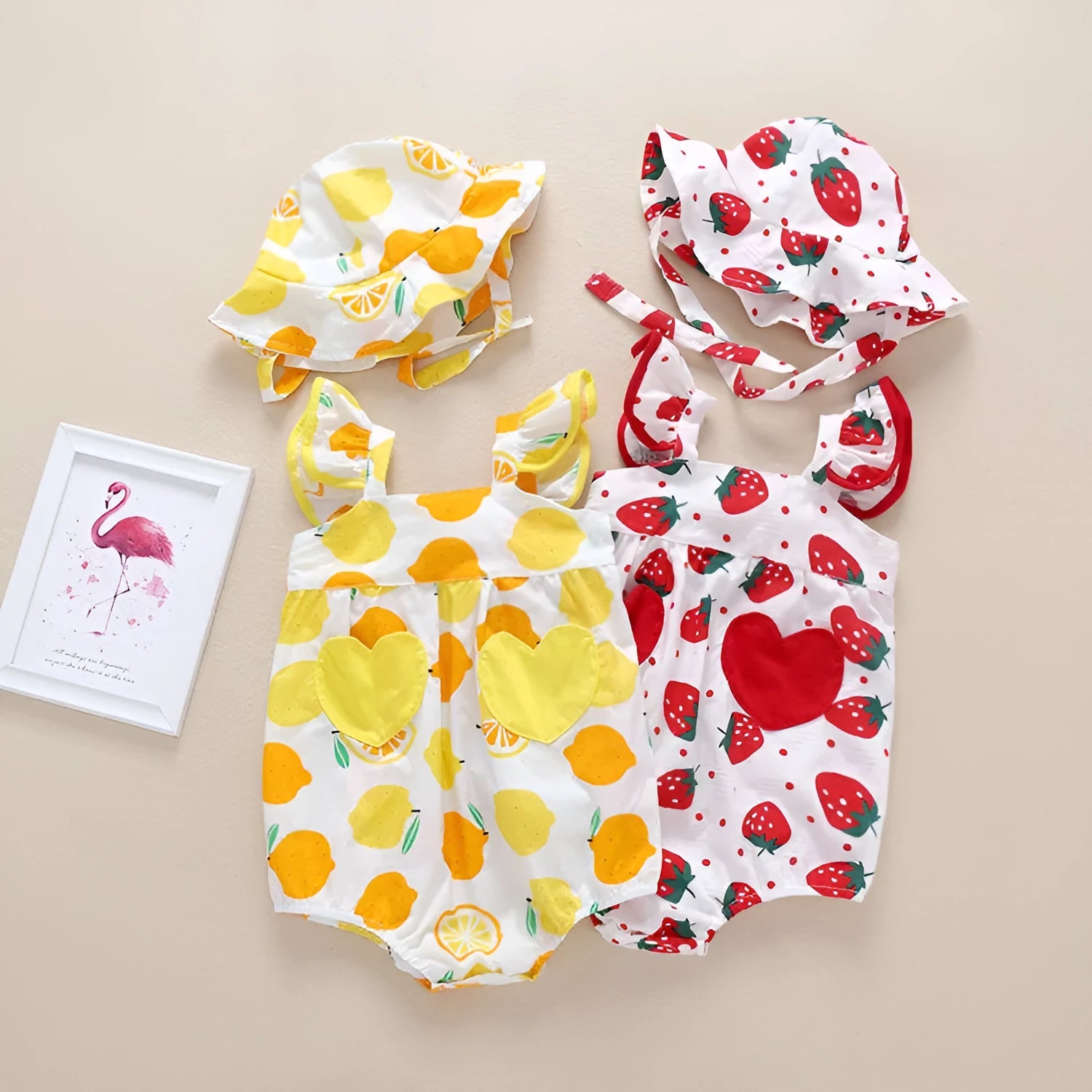 Cotton summer baby romper triangle jumpsuit in yellow with removable hat on white background