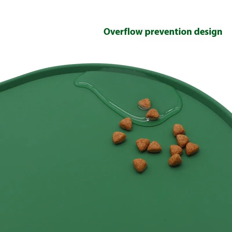 Green silicone waterproof cat feeding placemat with non-slip backing under a food bowl