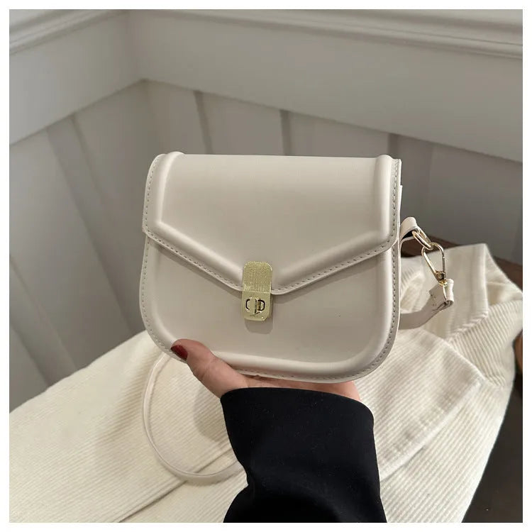 Unisex PU leather clamshell shoulder messenger bag in horizontal square design with adjustable strap