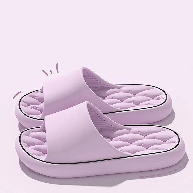 Non-slip EVA bathroom slippers with thick sole and hollow upper in grey, side view