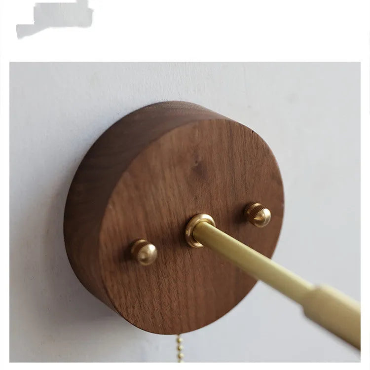 Nordic style wooden wall-mounted lamp with plug, shown in walnut colour finish.