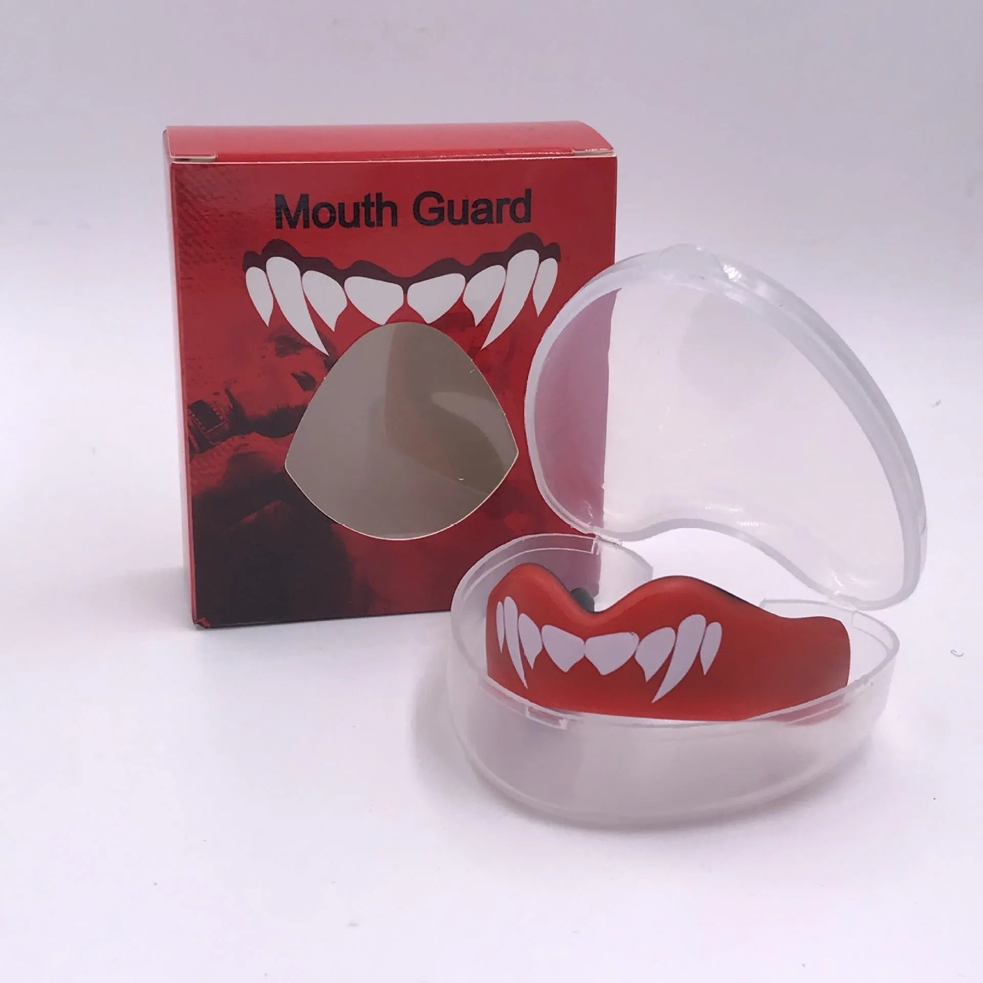 Adult boxing mouthguard with printed teeth design in black/white, red/white, and blue/white colour options