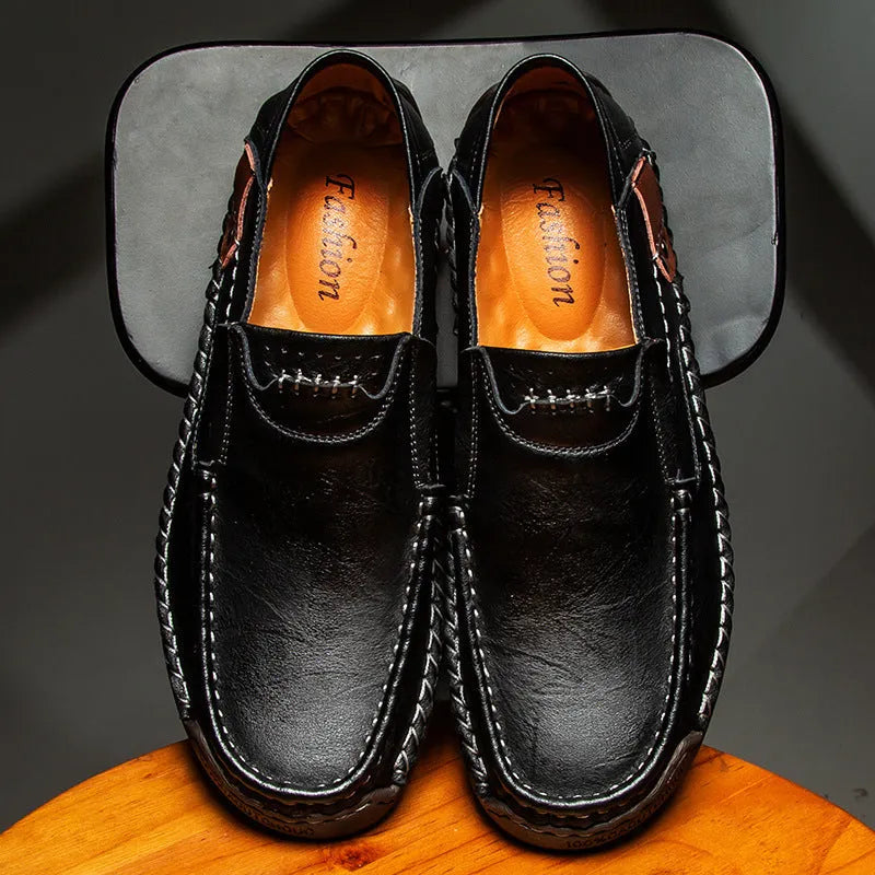 Men's casual leather shoes in black with soft rubber sole, round toe, and low heel