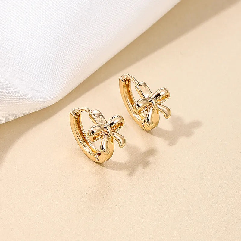 Copper earrings for women with bow and cherry shapes in gold, silver, and rose gold electroplated finishes