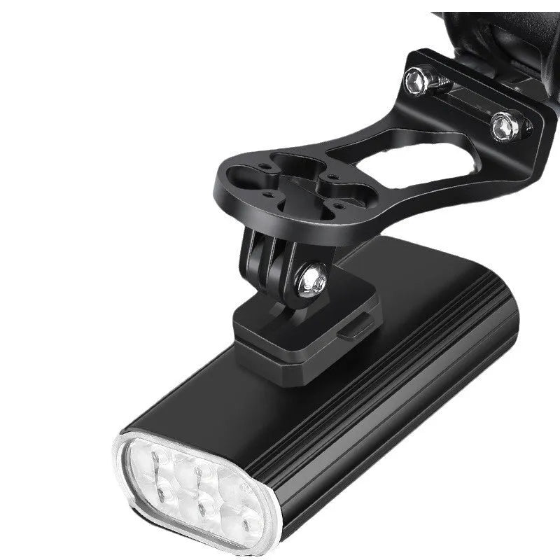 Aluminium alloy bicycle front light with 6 LEDs, USB Type-C port, and quick-release mount on handlebars.