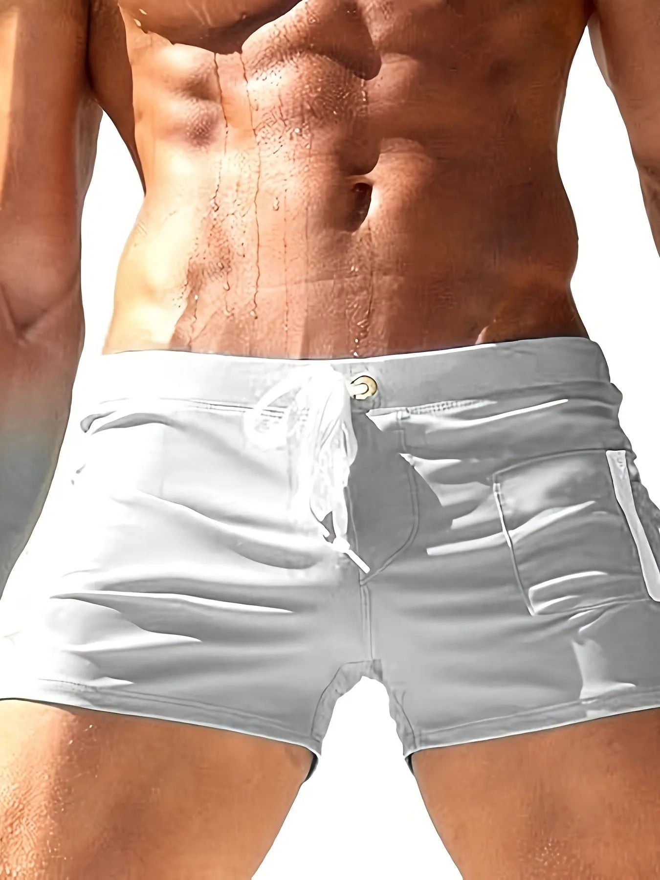 Men's black high-waist polyester swimming trunks with a lace-up front closure.