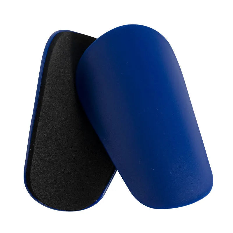 PU mini shin guards in black, white, red, and dream blue colours with S and XS sizing codes