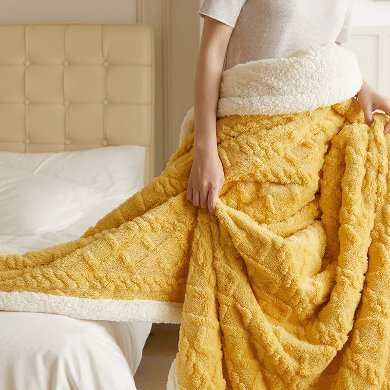 Polyester thermal flannel blanket in tea green colour on bed