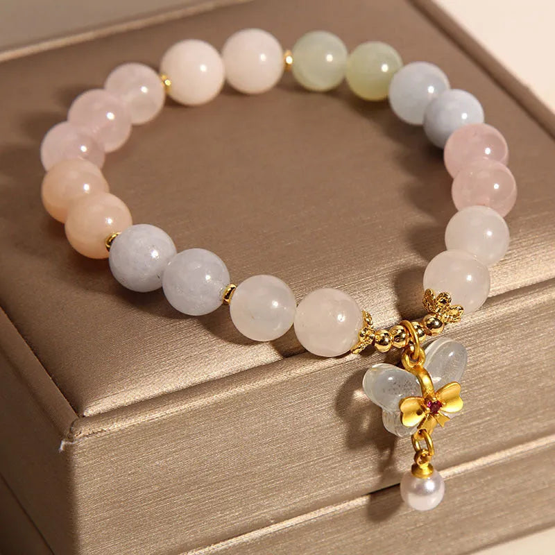 Women's crystal bracelet with colourful morganite butterfly pendant on an adjustable chain.