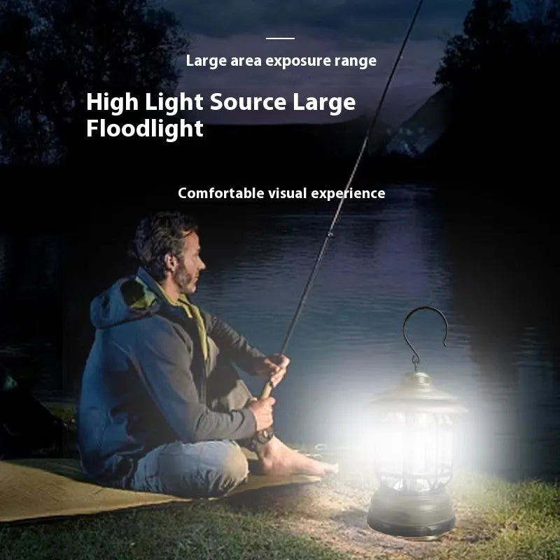 Dark green portable LED camping lantern and head lamp showing compact design and head strap.