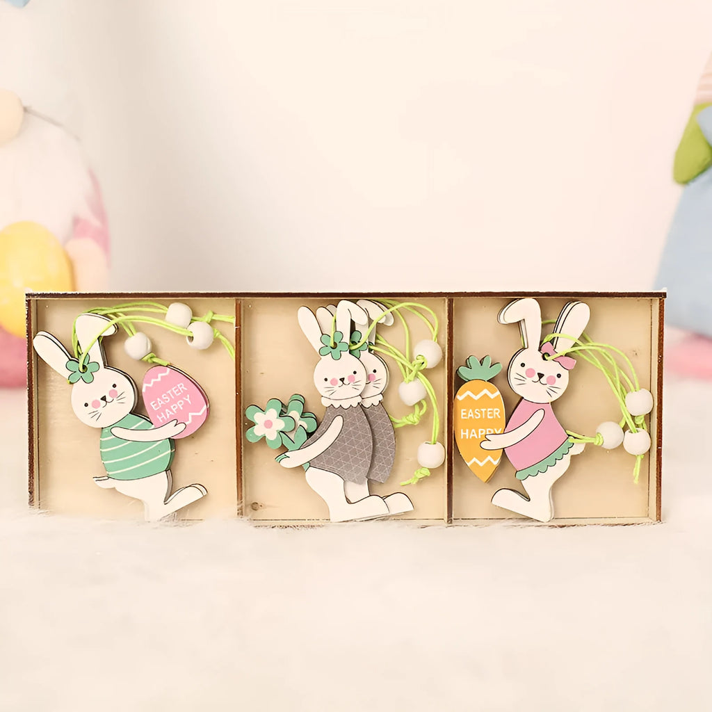 Set of 9 painted wooden Easter pendants with bunny, egg, and owl designs on a light background