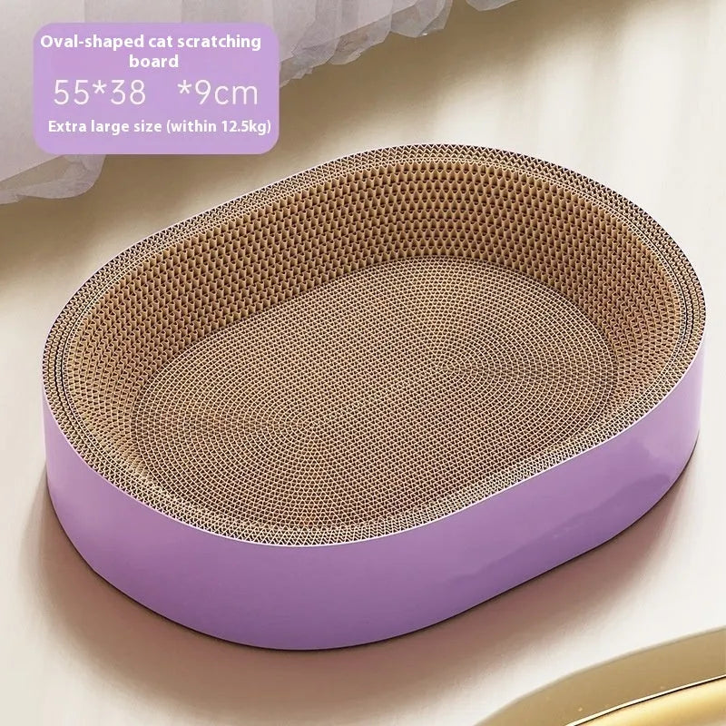 Green oval corrugated paper cat scratch board and nest, 55cm in diameter.