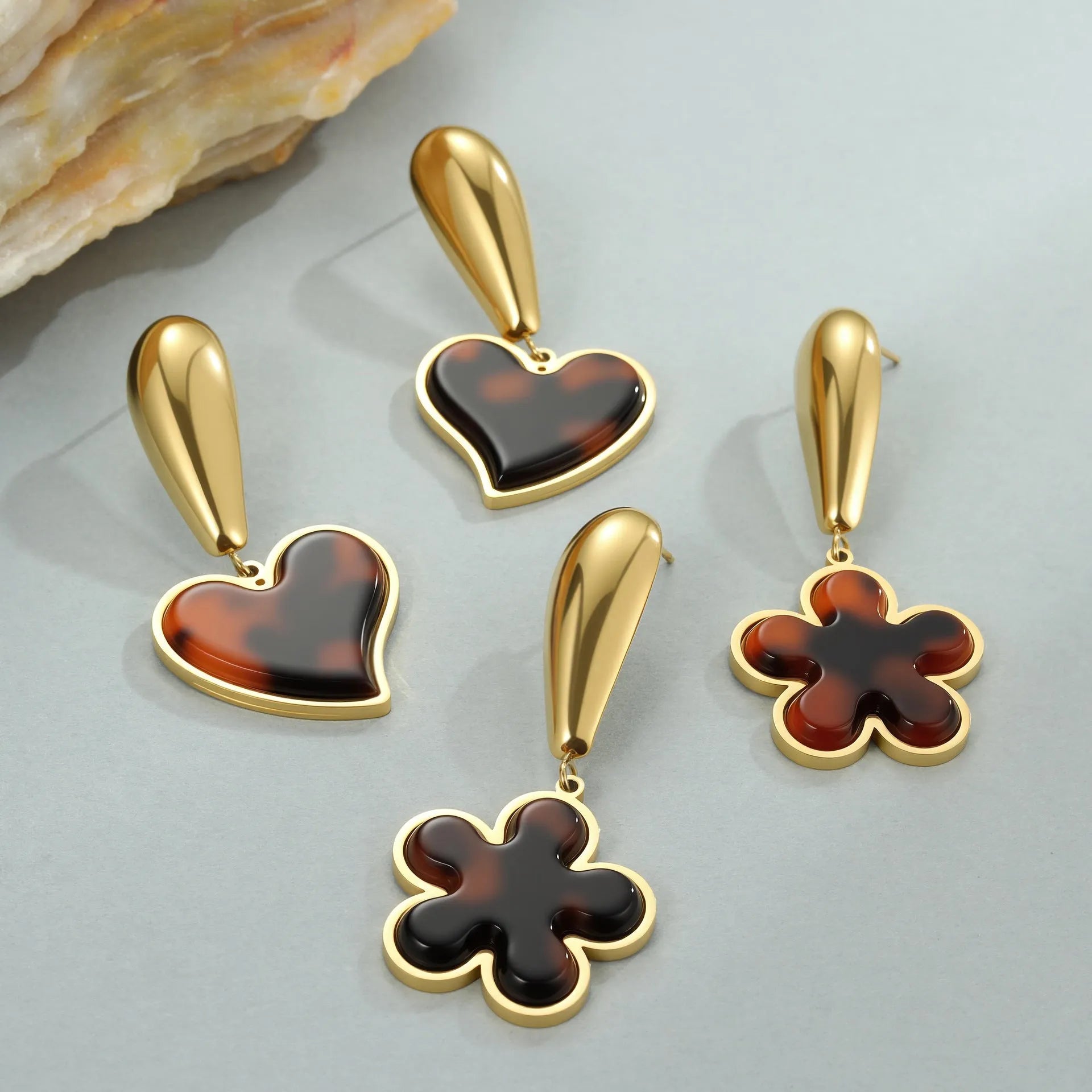 Tortoiseshell resin hawksbill colour earrings with stainless steel construction and geometric designs