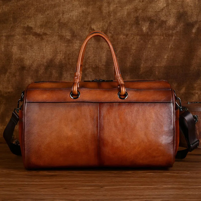Vintage brown retro leather bag made from top-layer cowhide with under 20L capacity